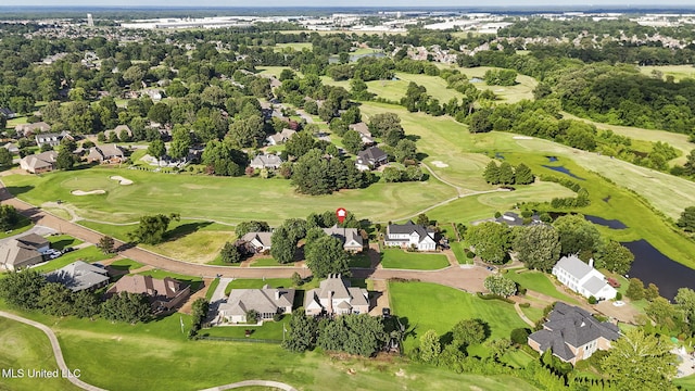 7906 Kirkwood Cv, Olive Branch, MS 38654 - aerial view of property and surrounding area with nearby suburban area, a local golf course, and a nearby body of water