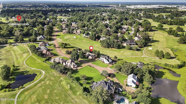 7906 Kirkwood Cv, Olive Branch, MS 38654 - aerial overview of property's location featuring a large body of water, nearby suburban area, and a golf club