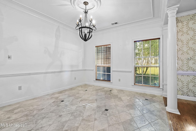 7906 Kirkwood Cv, Olive Branch, MS 38654 - unfurnished dining area with ornate columns, a chandelier, ornamental molding, and wallpapered walls