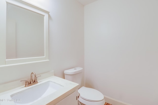 6910 Apuwai Pl, Diamondhead, MS 39525 - bathroom with vanity and toilet
