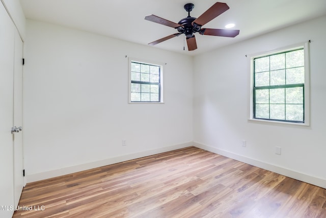 6910 Apuwai Pl, Diamondhead, MS 39525 - spare room featuring light wood-type flooring, a ceiling fan, and recessed lighting