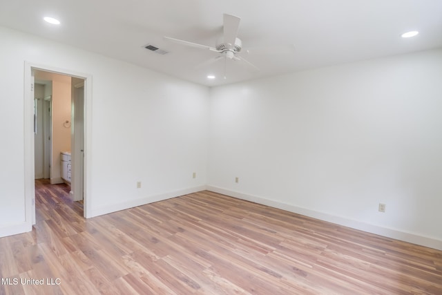 6910 Apuwai Pl, Diamondhead, MS 39525 - spare room with ceiling fan, light wood-style floors, and recessed lighting