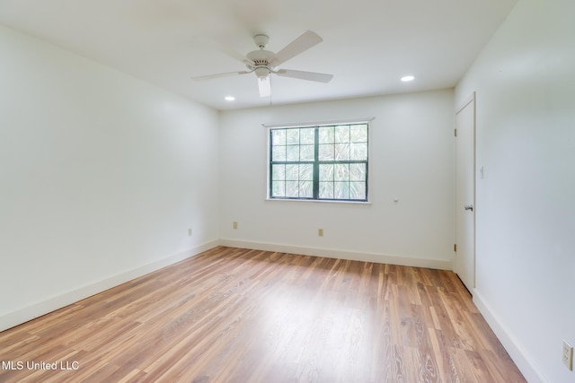 6910 Apuwai Pl, Diamondhead, MS 39525 - unfurnished room featuring light wood-type flooring, ceiling fan, and recessed lighting