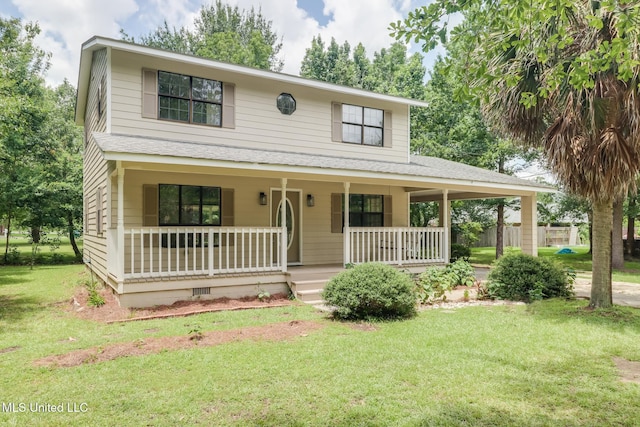 6910 Apuwai Pl, Diamondhead, MS 39525 - farmhouse inspired home featuring a porch, a front lawn, and roof with shingles