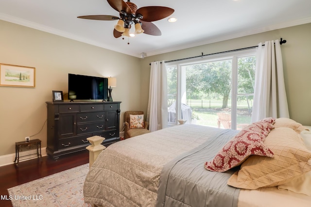 bedroom with wood finished floors, baseboards, crown molding, and ceiling fan