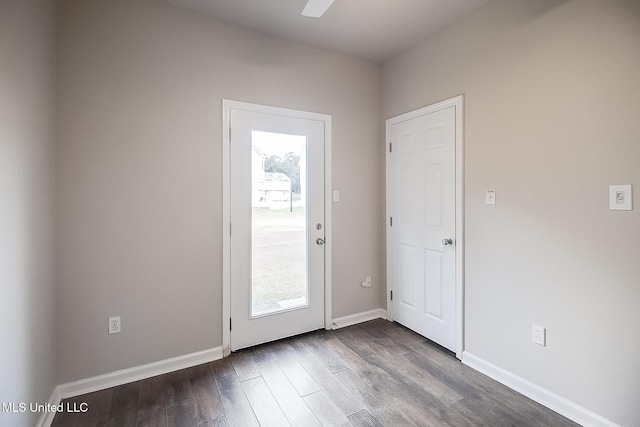 doorway to outside with wood-type flooring and ceiling fan