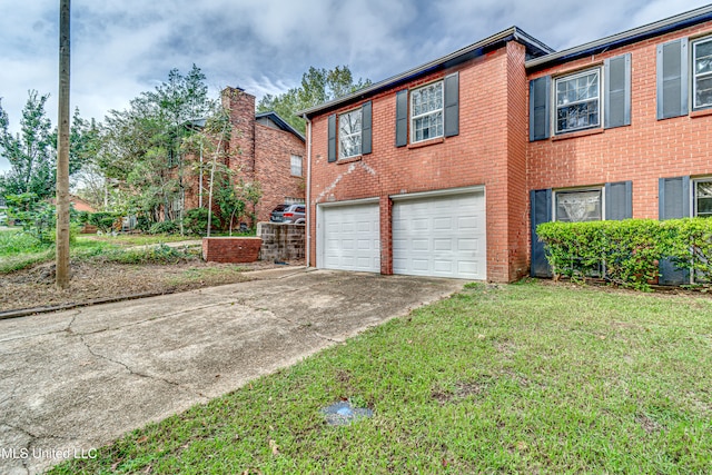 view of property exterior with a garage and a yard