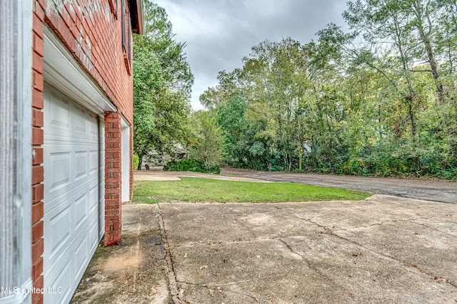 view of patio with a garage