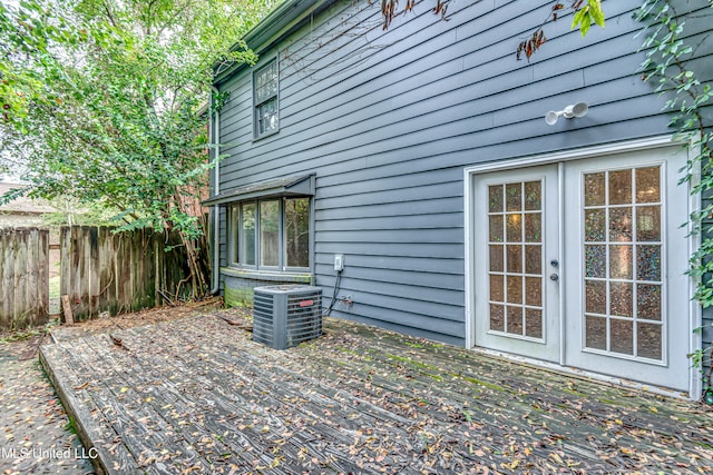 exterior space with central AC and french doors