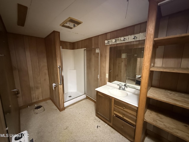 111 Muzzi Rd, Shaw, MS 38773 - full bath featuring vanity, wooden walls, and a stall shower