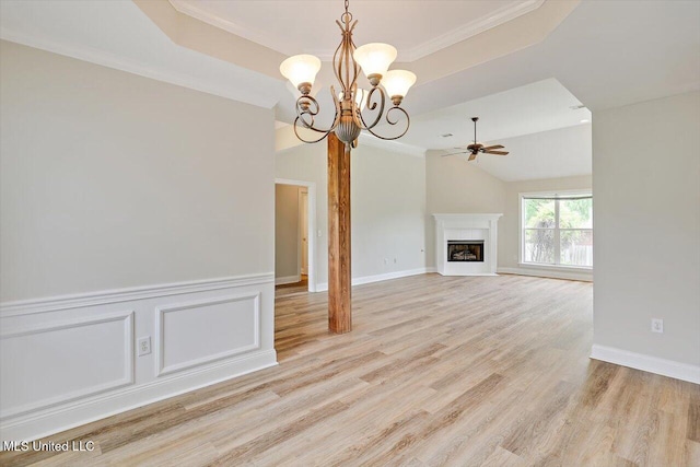 453 Abbey Woods, Brandon, MS 39047 - unfurnished living room with ceiling fan, a chandelier, ornamental molding, a raised ceiling, and light wood-type flooring