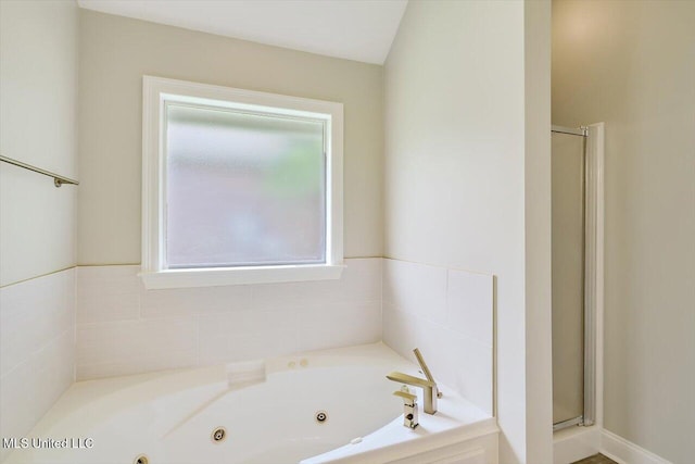 453 Abbey Woods, Brandon, MS 39047 - full bath featuring a shower stall and a tub with jets