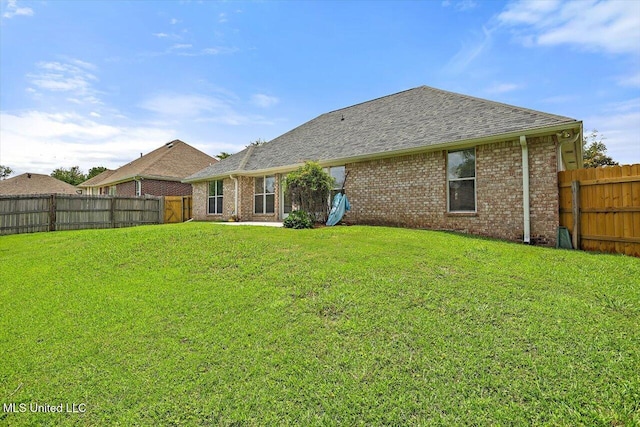 453 Abbey Woods, Brandon, MS 39047 - back of house with brick siding and roof with shingles