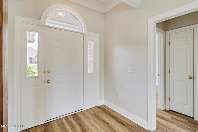 453 Abbey Woods, Brandon, MS 39047 - foyer entrance with light wood finished floors, baseboards, and crown molding