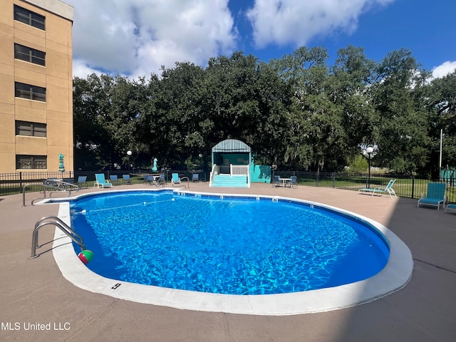 view of pool with a patio