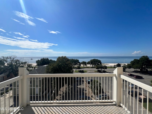 balcony featuring a water view