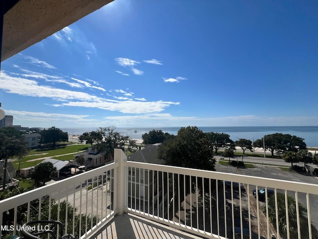 balcony featuring a water view