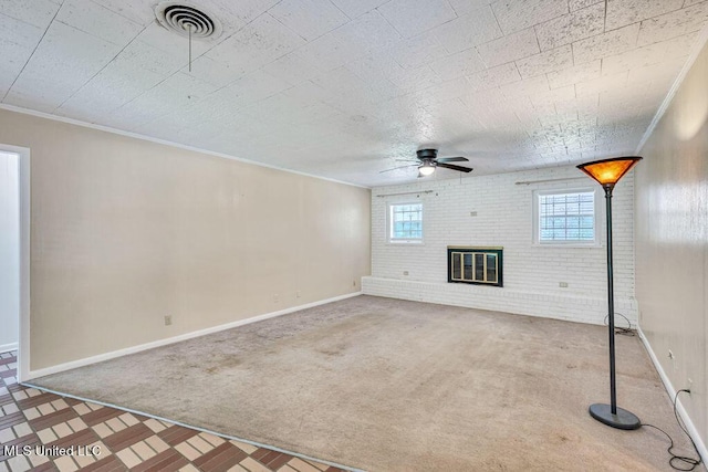 20332 Red Bird Hill Rd, Gulfport, MS 39503 - unfurnished living room featuring carpet floors, a ceiling fan, a brick fireplace, baseboards, and ornamental molding