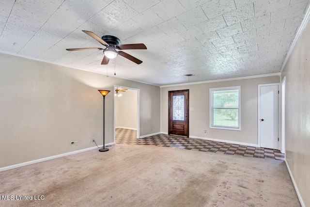 20332 Red Bird Hill Rd, Gulfport, MS 39503 - carpeted foyer featuring a ceiling fan, crown molding, and baseboards