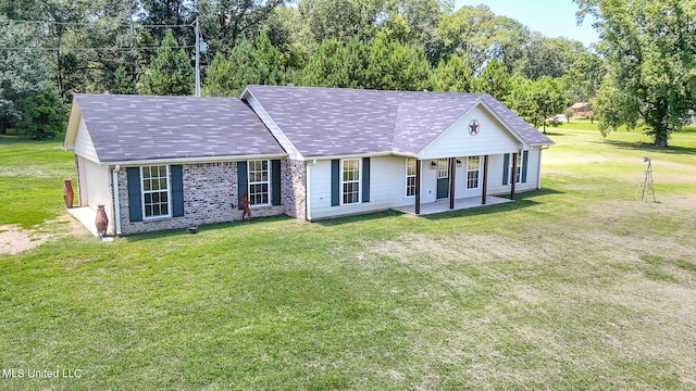 ranch-style house with a front yard