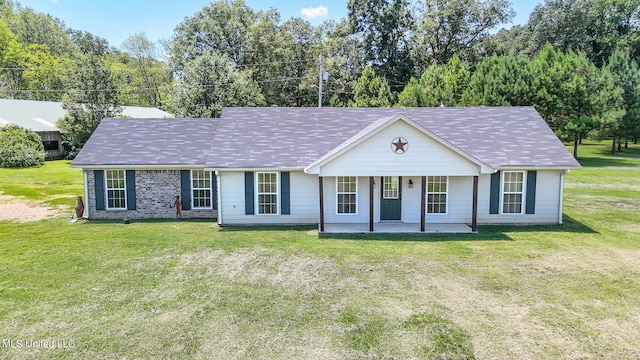 ranch-style house with a front yard