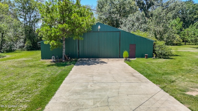 view of outbuilding with a lawn