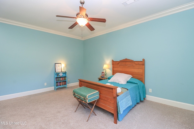 bedroom with crown molding, carpet floors, and ceiling fan