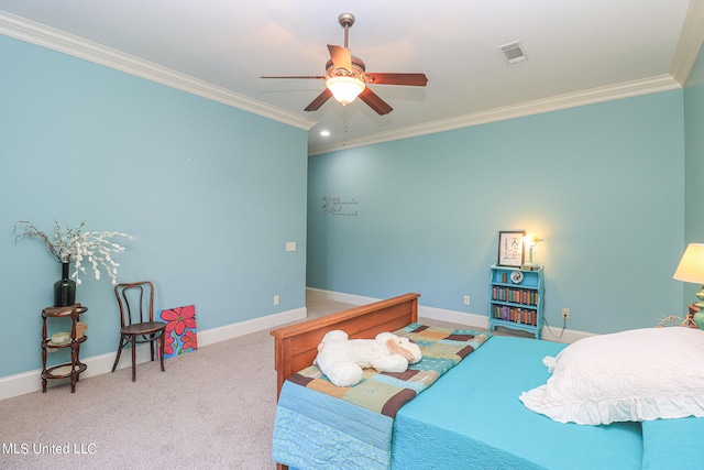 bedroom featuring ceiling fan, crown molding, and carpet floors