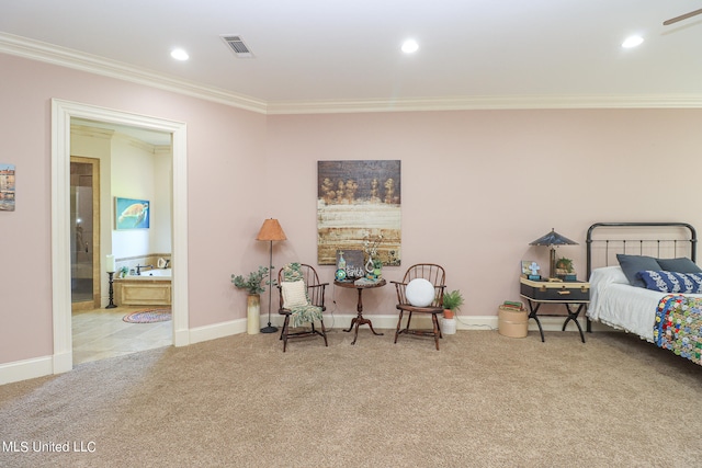 bedroom with ornamental molding and light carpet