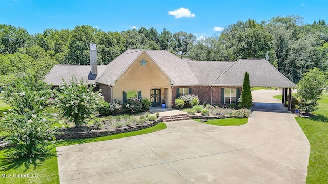 view of front of house featuring a carport