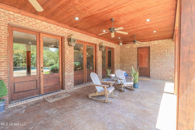 view of patio / terrace featuring french doors and ceiling fan