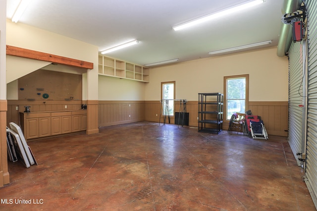 garage with wood walls