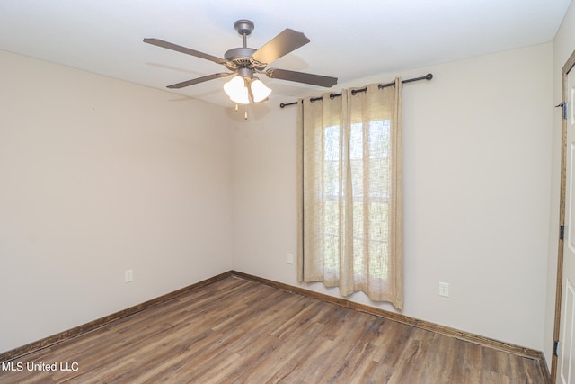 unfurnished room with hardwood / wood-style flooring and ceiling fan