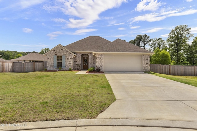 123 Bailey Cv, Canton, MS 39046 - view of front of home featuring an attached garage, driveway, brick siding, and a shingled roof