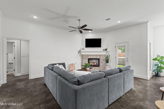 123 Bailey Cv, Canton, MS 39046 - living area featuring ceiling fan, a brick fireplace, ornamental molding, baseboards, and recessed lighting