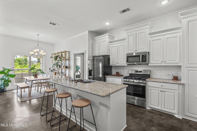 123 Bailey Cv, Canton, MS 39046 - kitchen with appliances with stainless steel finishes, a sink, tasteful backsplash, concrete floors, and ornamental molding