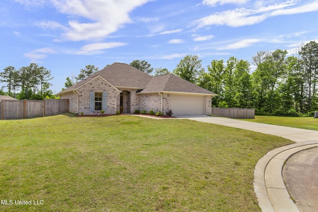 123 Bailey Cv, Canton, MS 39046 - view of front of house with brick siding, driveway, a garage, and roof with shingles