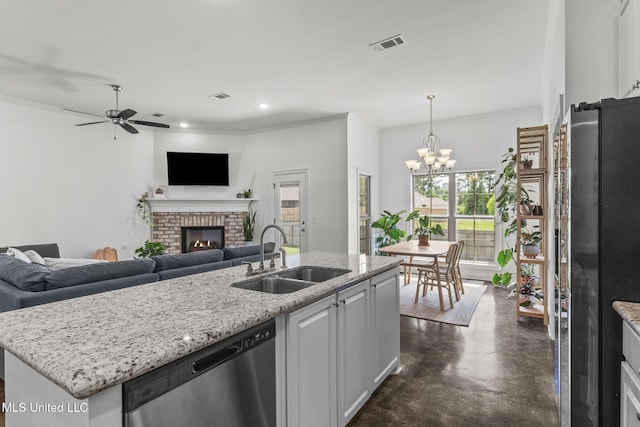123 Bailey Cv, Canton, MS 39046 - kitchen featuring a sink, appliances with stainless steel finishes, concrete flooring, open floor plan, and recessed lighting