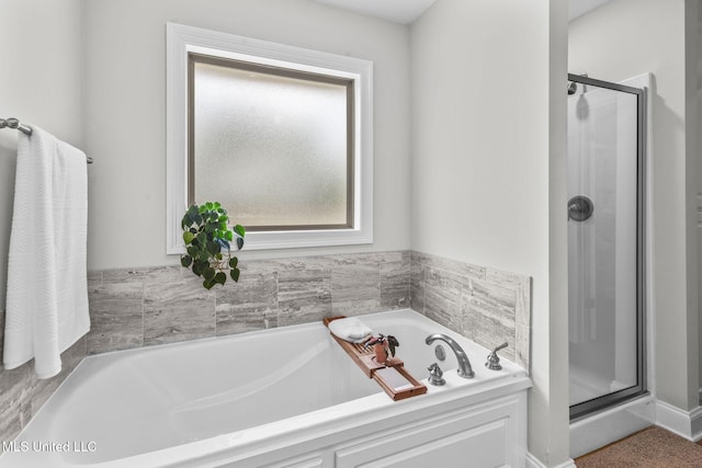 123 Bailey Cv, Canton, MS 39046 - full bathroom with a stall shower and a bath