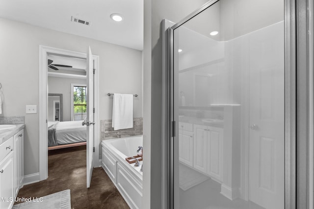123 Bailey Cv, Canton, MS 39046 - full bathroom with connected bathroom, vanity, a garden tub, concrete floors, and a shower with shower door
