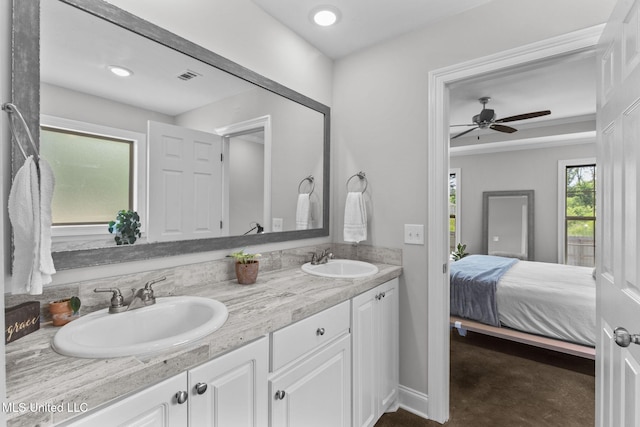 123 Bailey Cv, Canton, MS 39046 - ensuite bathroom featuring double vanity, ceiling fan, and recessed lighting