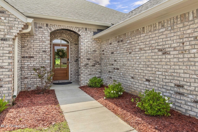 123 Bailey Cv, Canton, MS 39046 - entrance to property featuring brick siding and a shingled roof