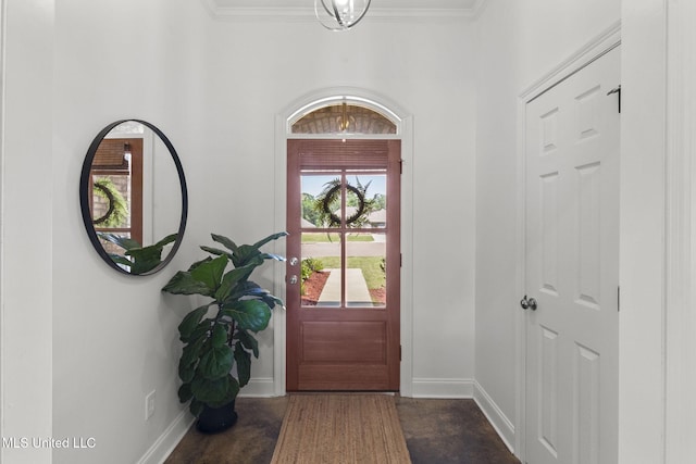 123 Bailey Cv, Canton, MS 39046 - foyer entrance featuring baseboards, crown molding, and concrete floors
