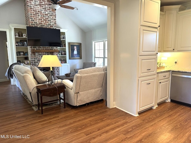 4 Bayou Ln, Natchez, MS 39120 - living area with lofted ceiling, a ceiling fan, a fireplace, light wood finished floors, and baseboards