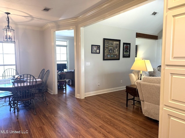 4 Bayou Ln, Natchez, MS 39120 - dining area featuring dark wood finished floors, visible vents, and baseboards