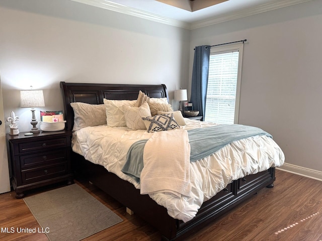 4 Bayou Ln, Natchez, MS 39120 - bedroom featuring dark wood finished floors, baseboards, and ornamental molding