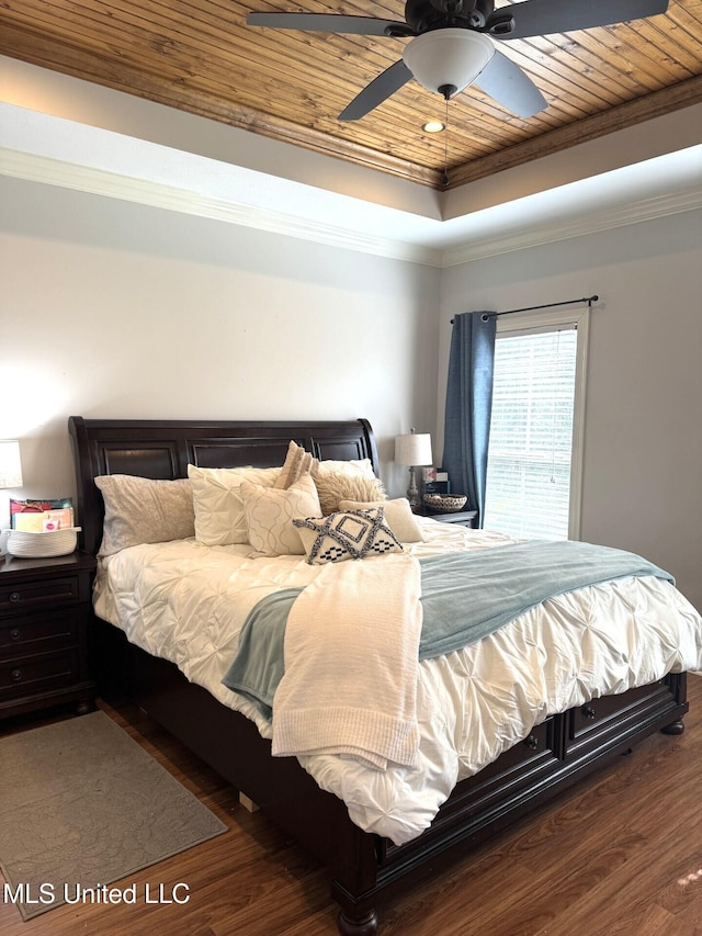 4 Bayou Ln, Natchez, MS 39120 - bedroom featuring wood finished floors, a tray ceiling, ceiling fan, ornamental molding, and wood ceiling