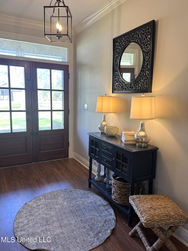4 Bayou Ln, Natchez, MS 39120 - foyer with french doors, wood finished floors, baseboards, and ornamental molding