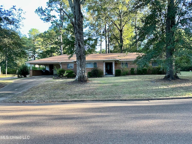 single story home with a carport