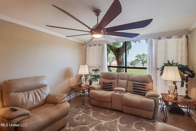 tiled living room with crown molding, ceiling fan, and baseboards